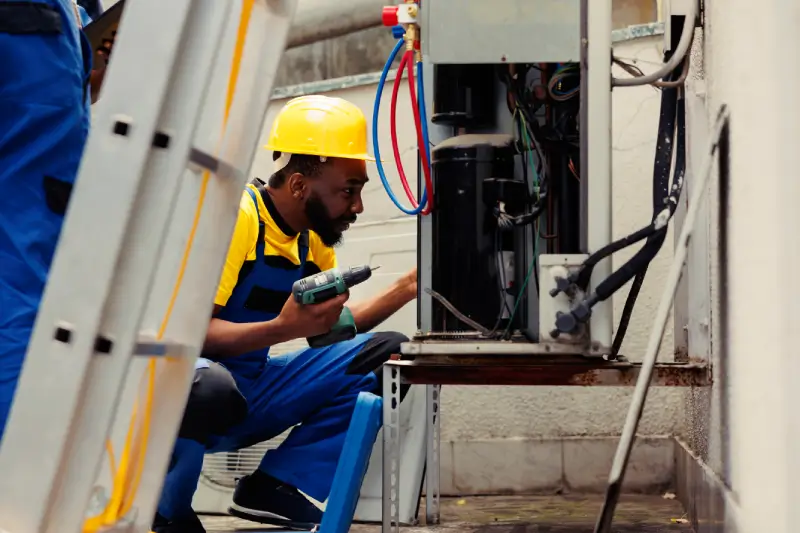 electricians repairing hvac system 2024 03 02 03 16 26 utc
