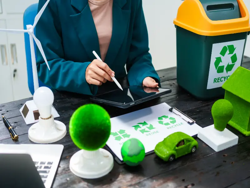 an asian businesswoman sits at her desk discussin 2026 01 08 07 53 53 utc